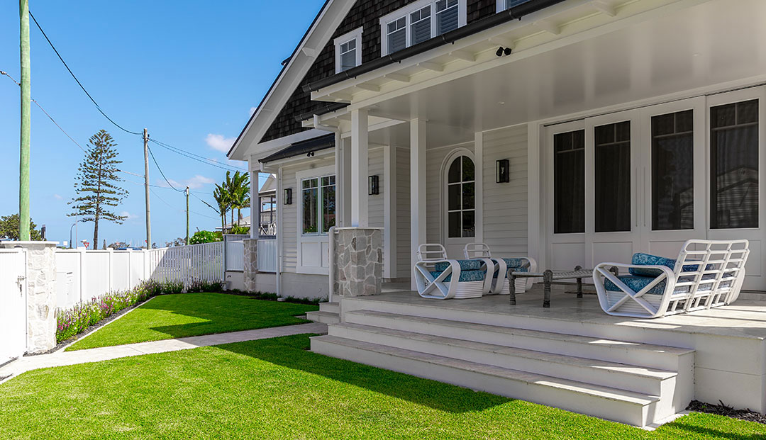 Cozy porch of a modern beach house with ocean view