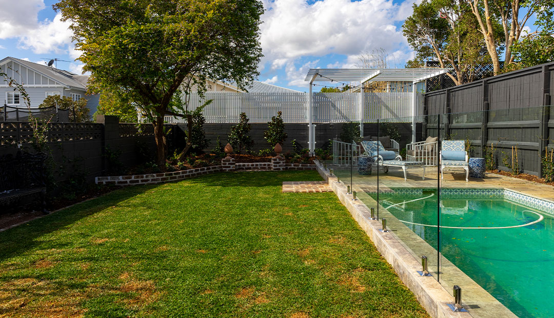 Tranquil backyard with pool in Gordon Street, Brisbane.